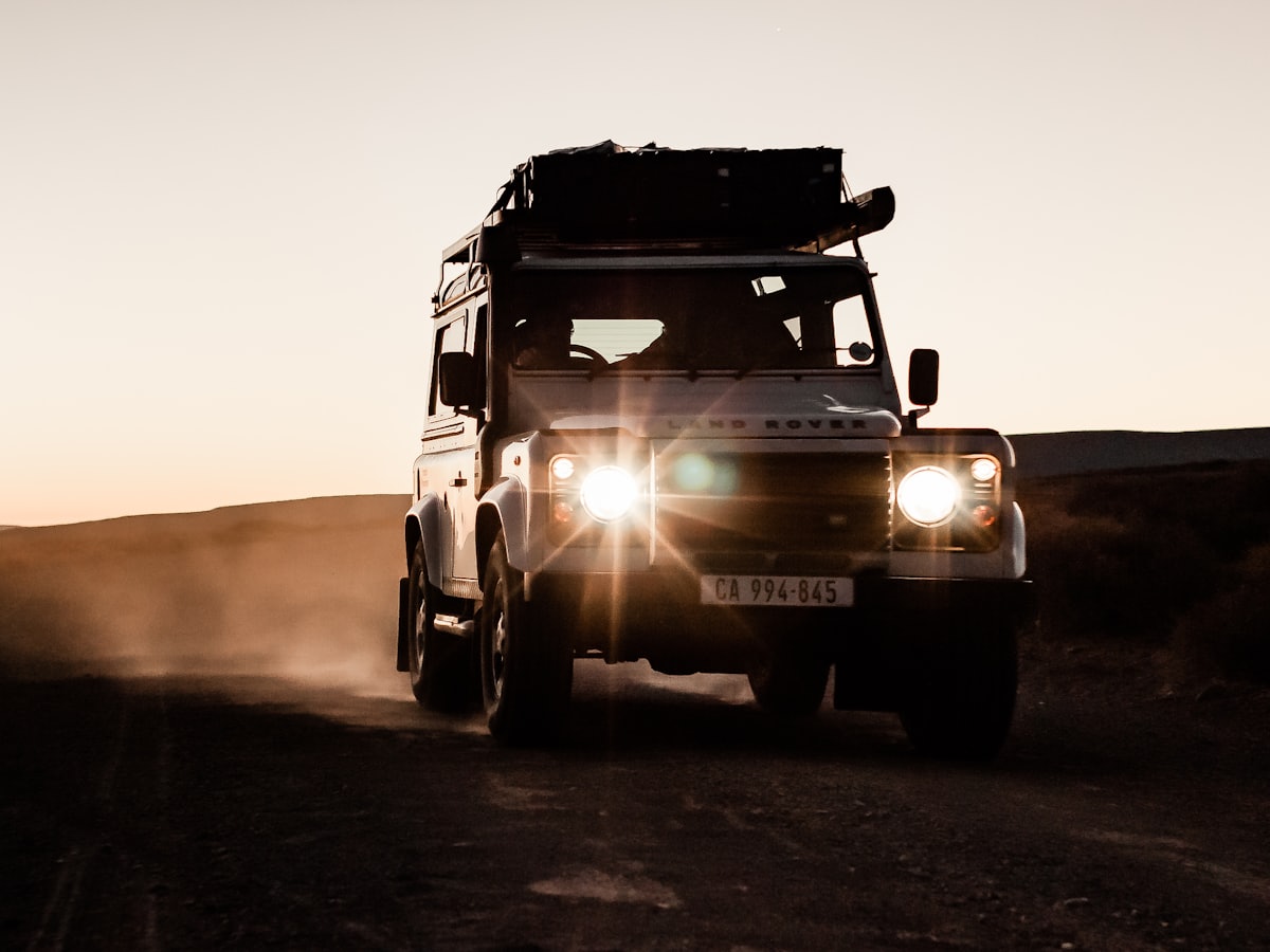A 4WD with its driving lights switched on