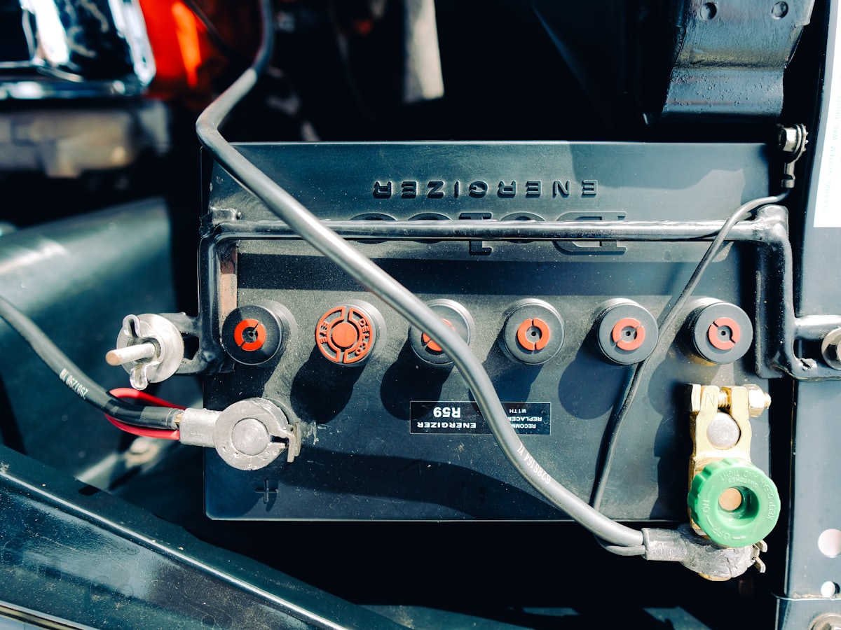 Battery terminals and cables in an engine bay